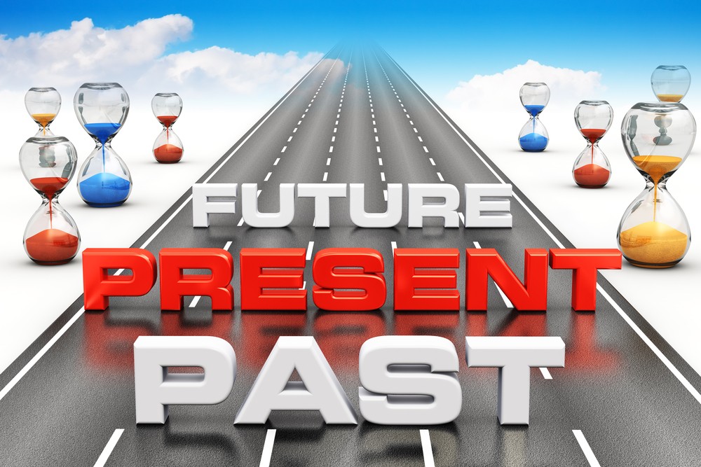 The road leading from past to future and sand watches measuring time